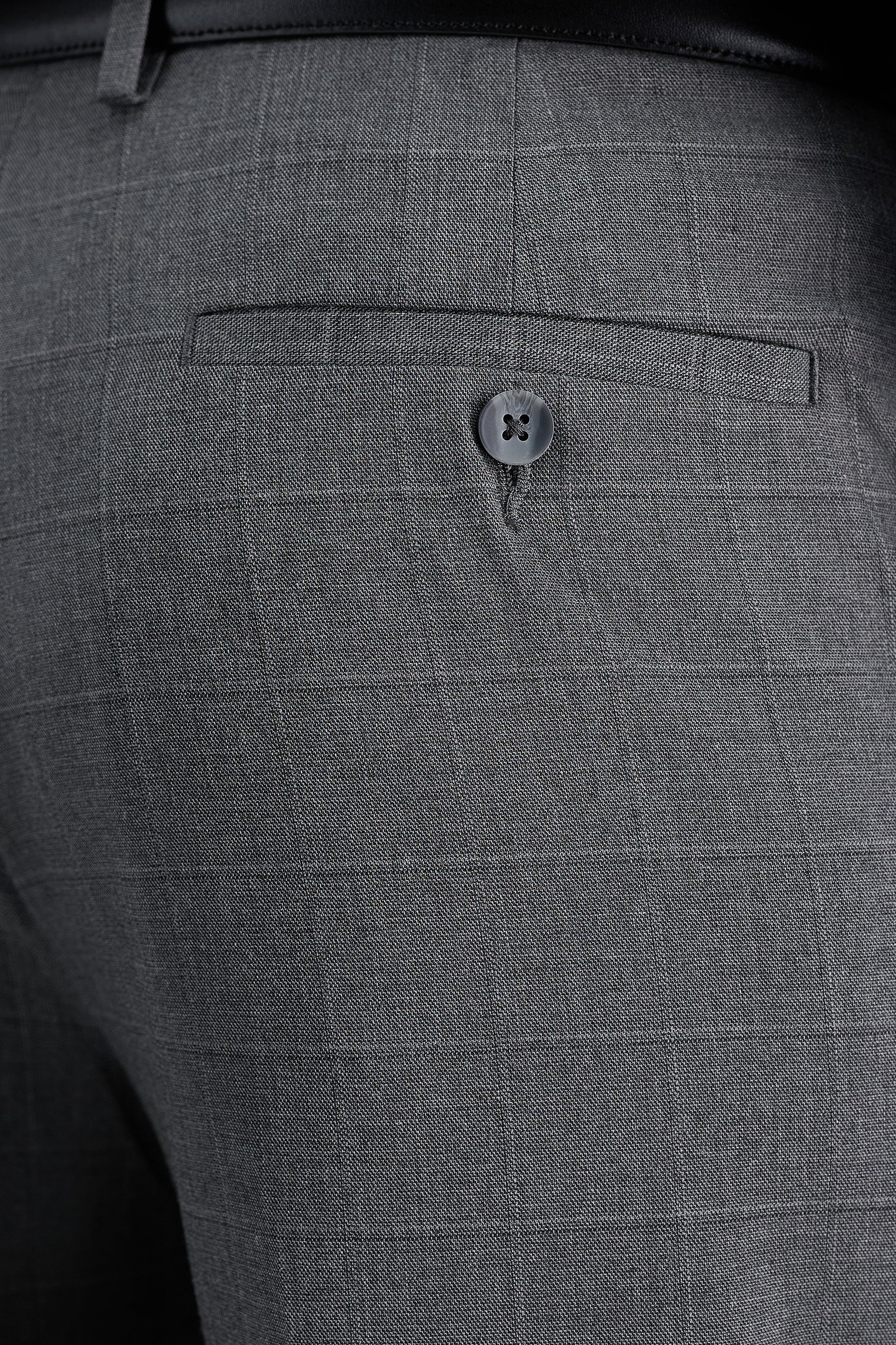 Haggar windowpane suit pant in classic pattern, tailored fit, with belt loops and front pockets, made from premium fabric.#color_med grey