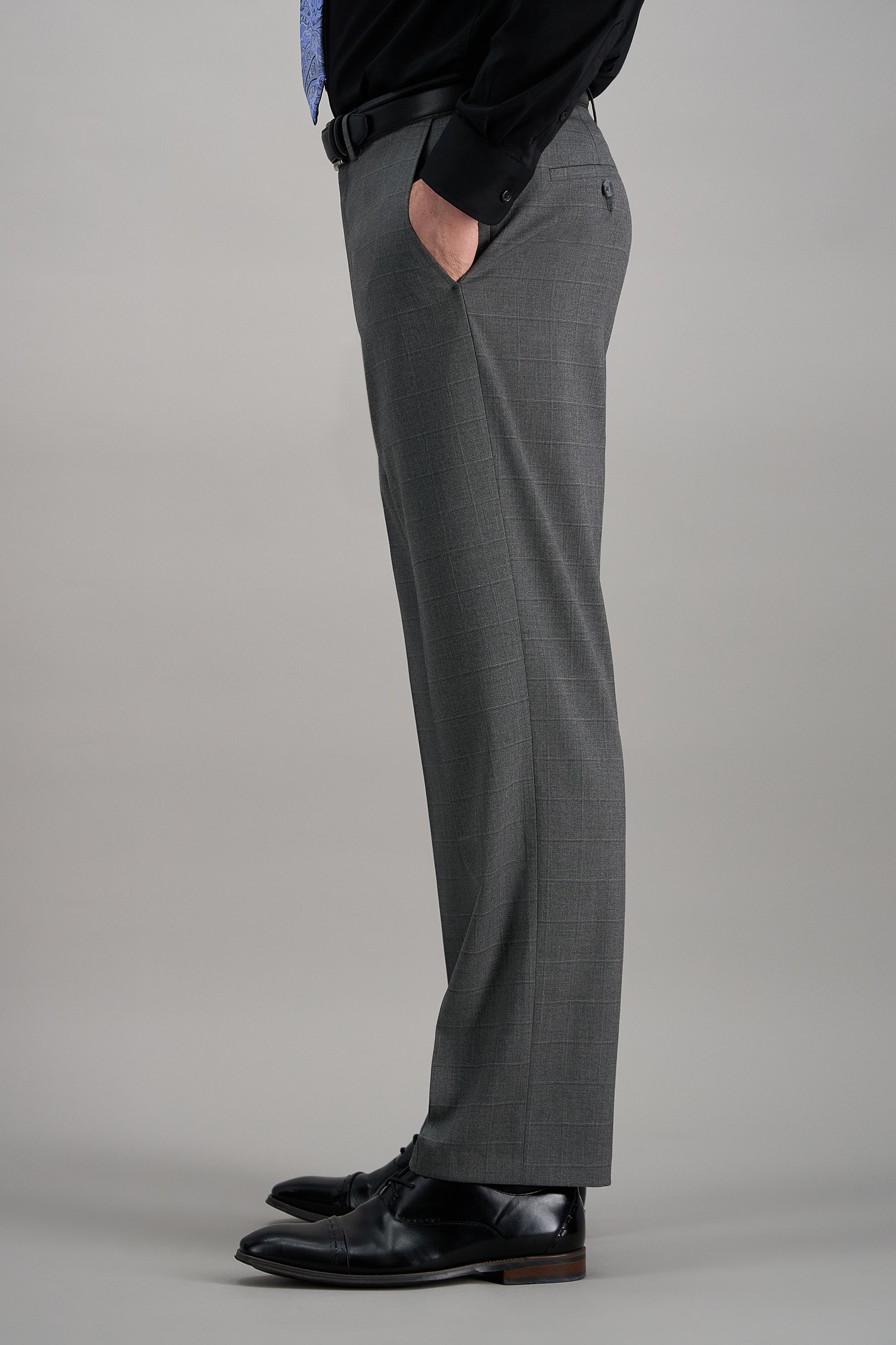 Haggar windowpane suit pant in classic gray with subtle checkered pattern, tailored fit, and front crease for professional look.#color_med grey