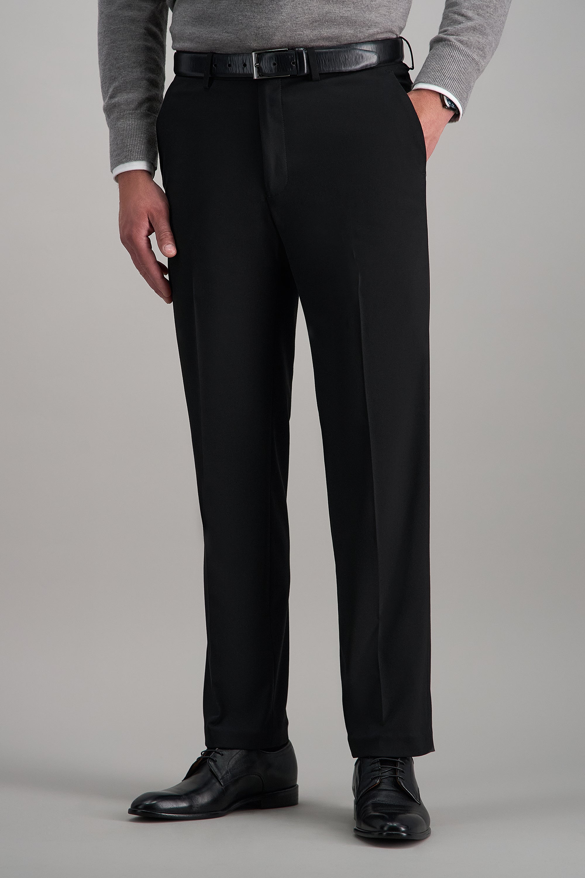 Haggar Premium Stretch Suit Pant in dark gray, tailored fit with classic crease, suitable for formal or business wear.#color_black