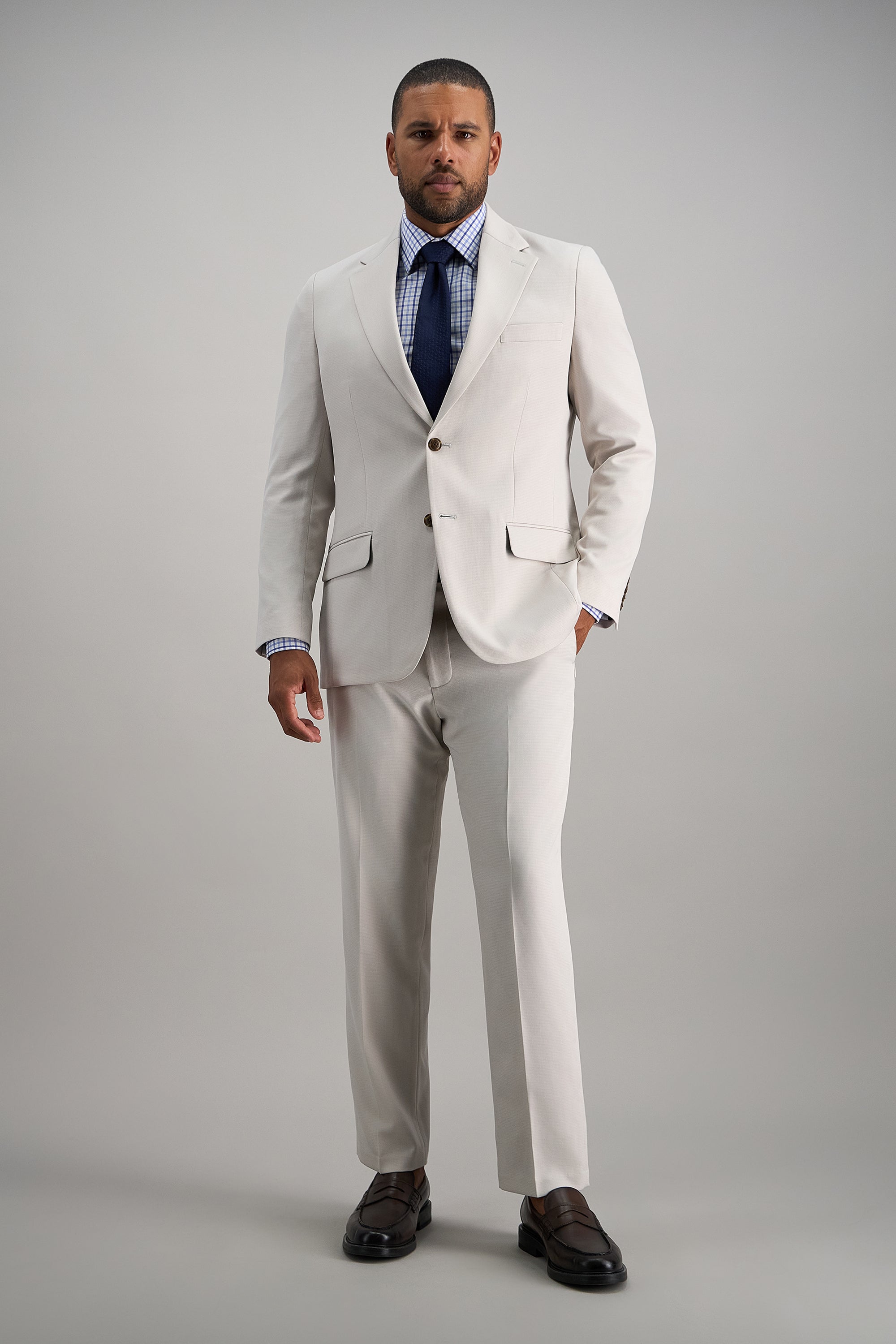 Haggar Smart Wash Repreve suit jacket in a tailored fit, featuring classic lapels and a smooth fabric finish.#color_string
