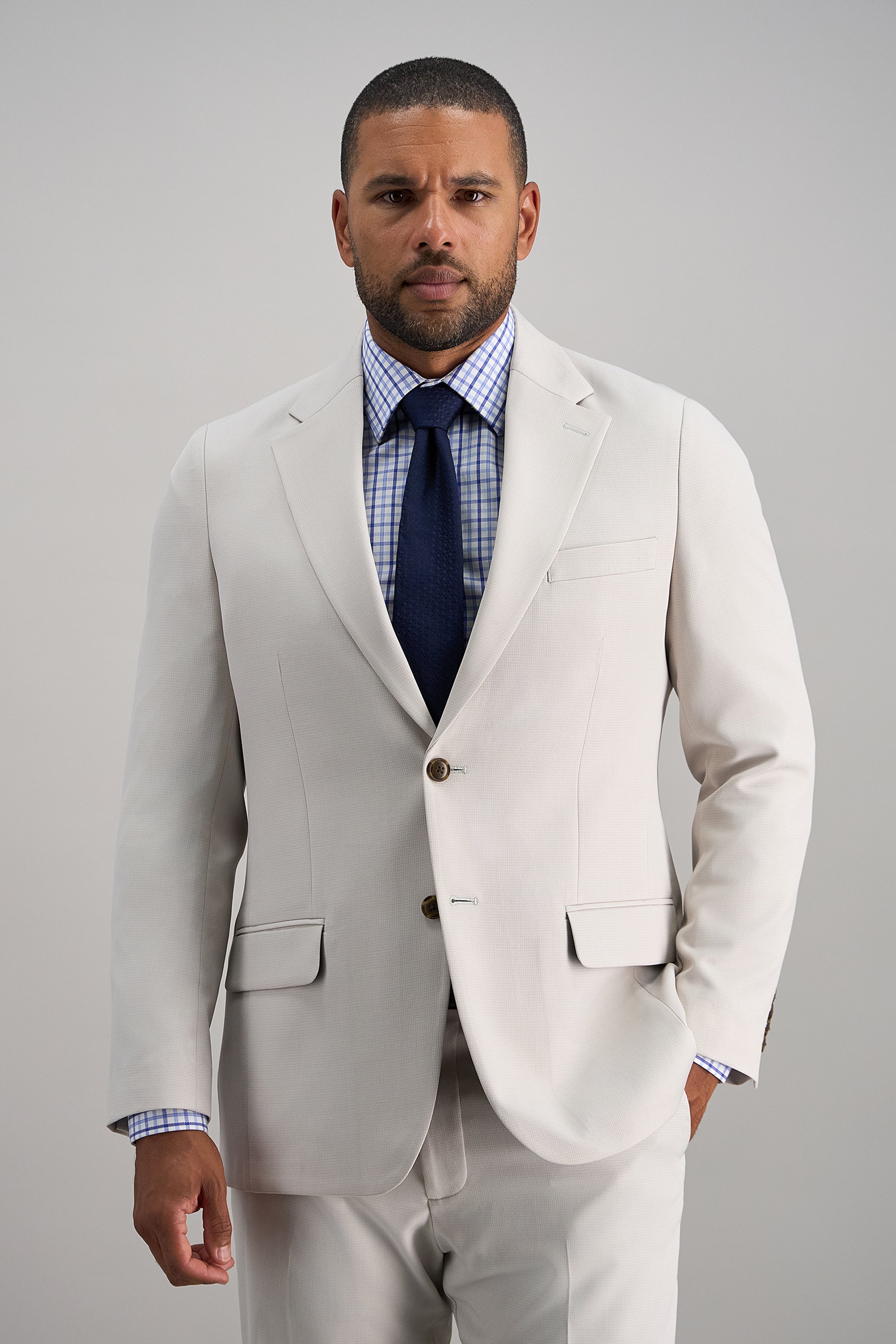 Haggar Smart Wash Repreve Suit Jacket in gray, tailored men's jacket with lapel collar and front buttons, styled for professional wear.#color_string