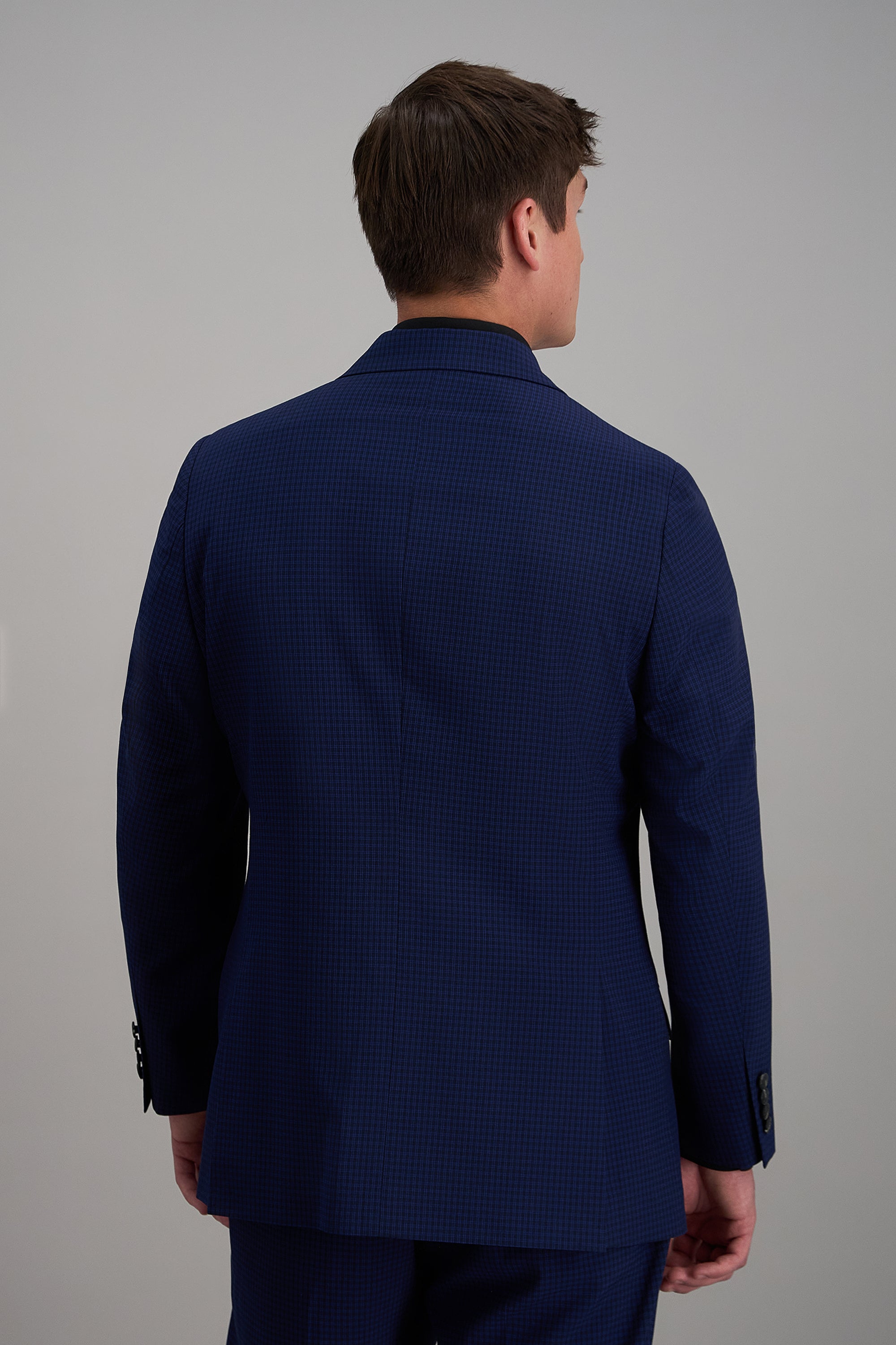 Haggar Pro Football Hall of Fame suit jacket in navy, tailored fit with notched lapels and two-button closure, front view.#color_blue