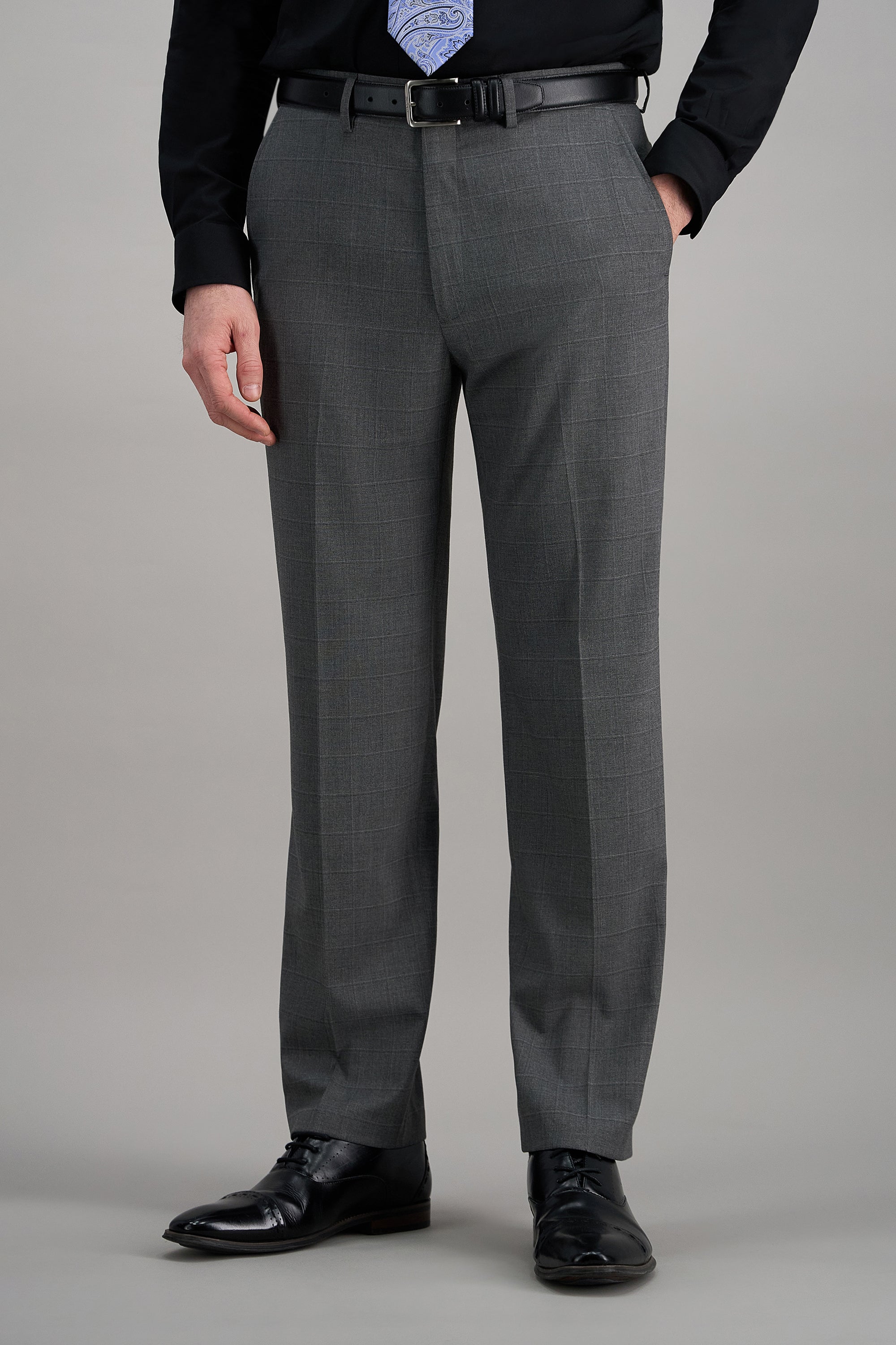 Haggar windowpane suit pants in gray with a tailored fit, featuring classic plaid pattern and belt loops.#color_med grey