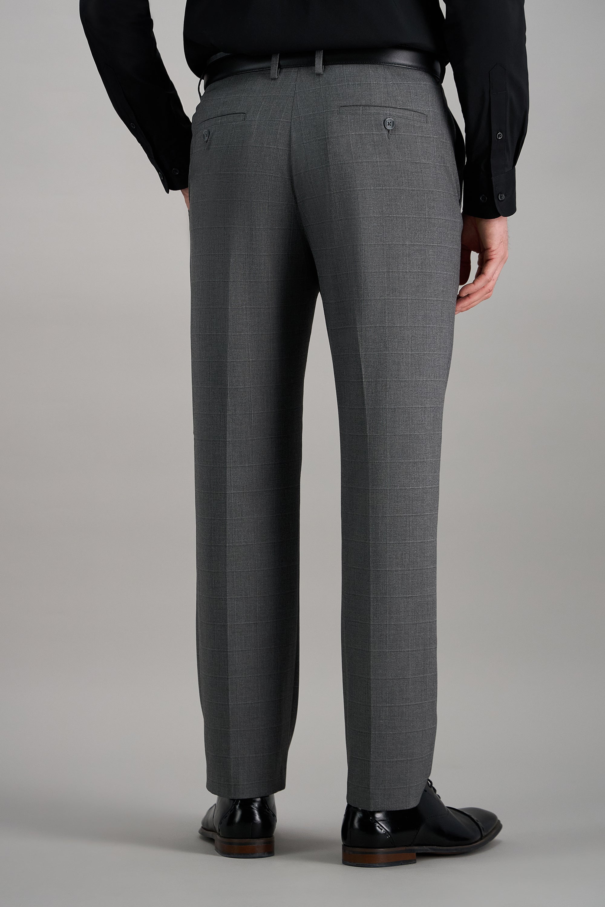 Haggar windowpane suit pant in gray with a classic tailored fit, featuring a flat front and belt loops.#color_med grey