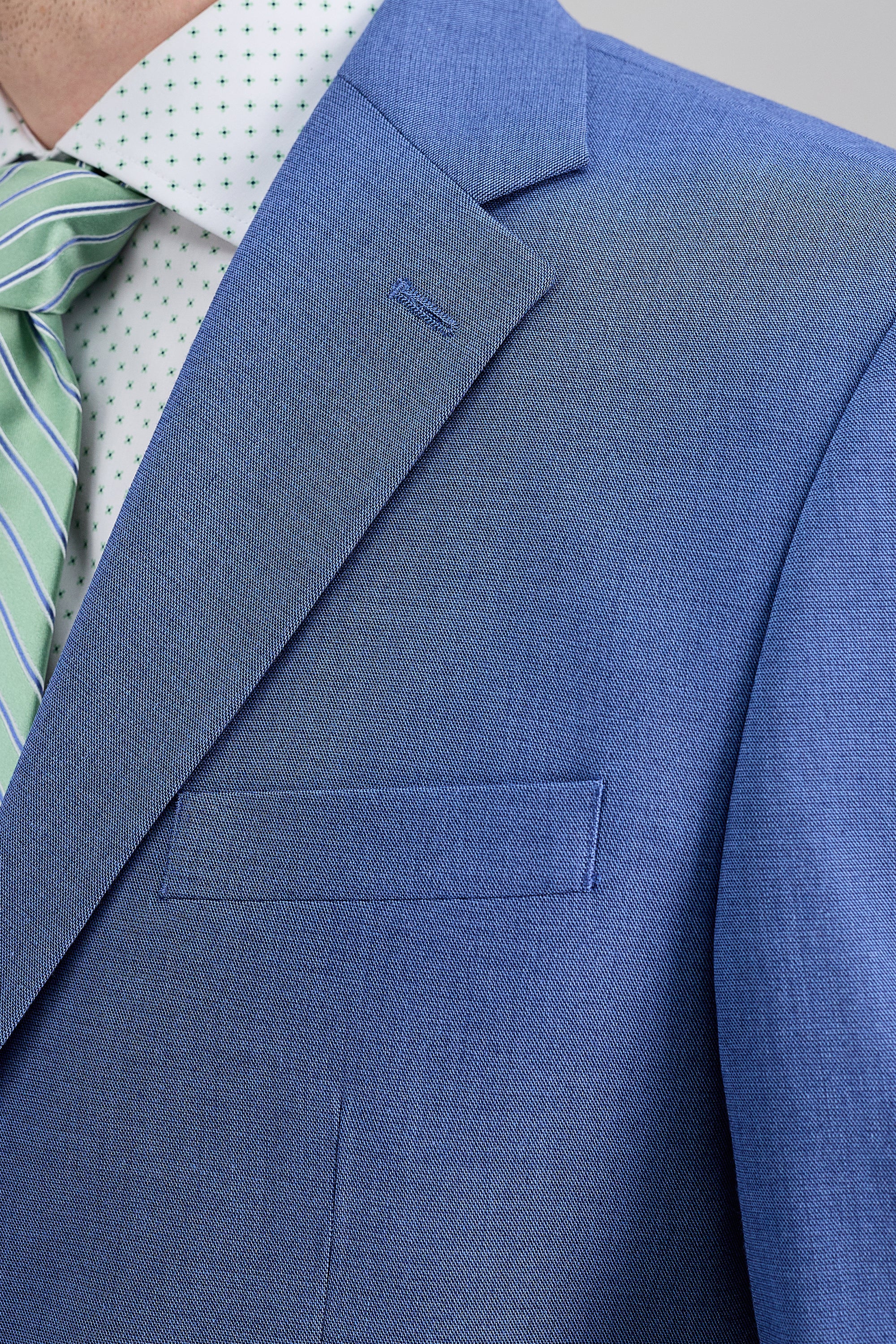 Haggar Premium Stretch Suit Coat in navy blue, featuring a tailored fit and modern design for versatile styling.#color_lt blue