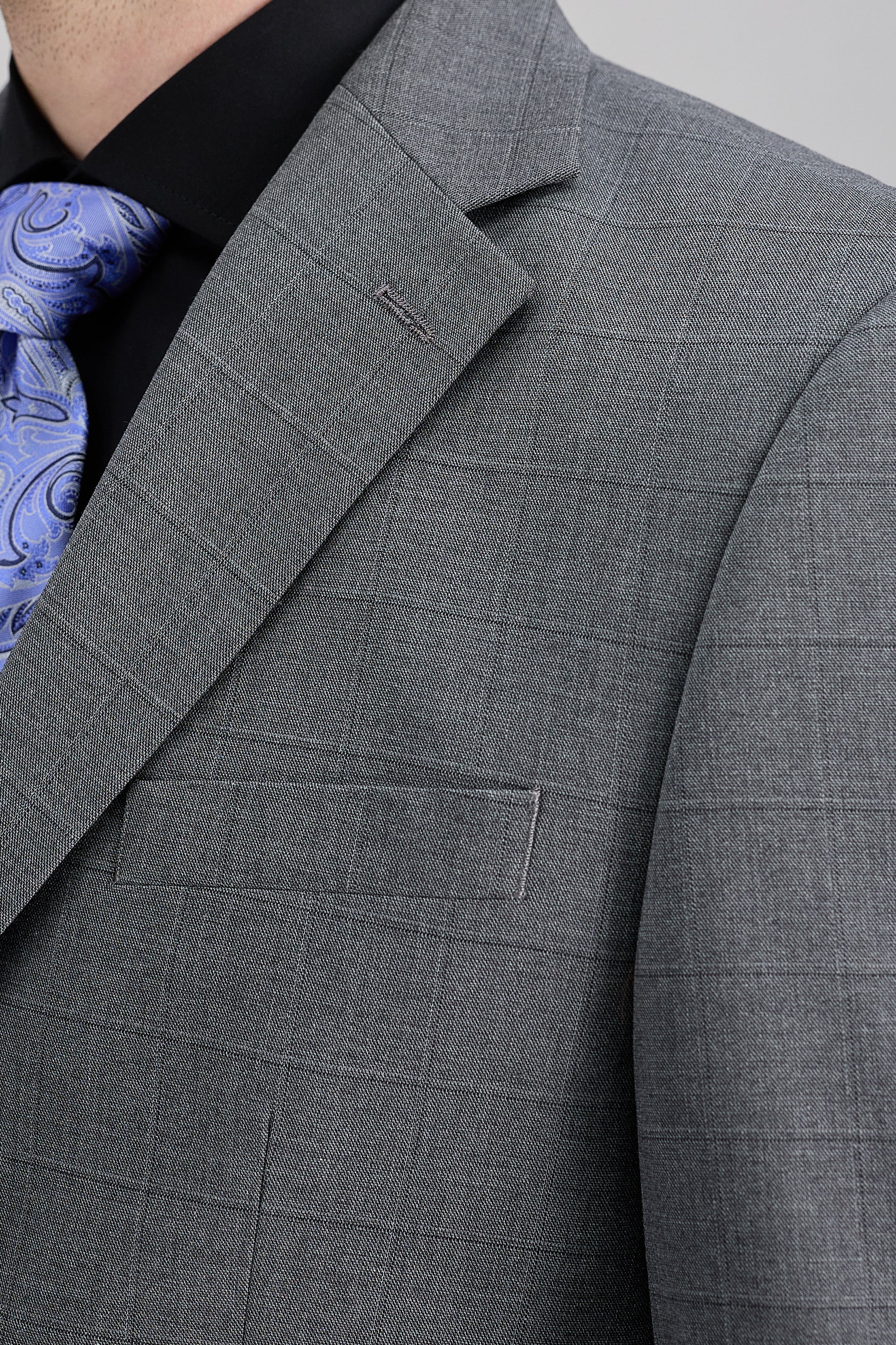 J.M. Haggar windowpane suit jacket in a sophisticated design, featuring a tailored fit and classic colors.